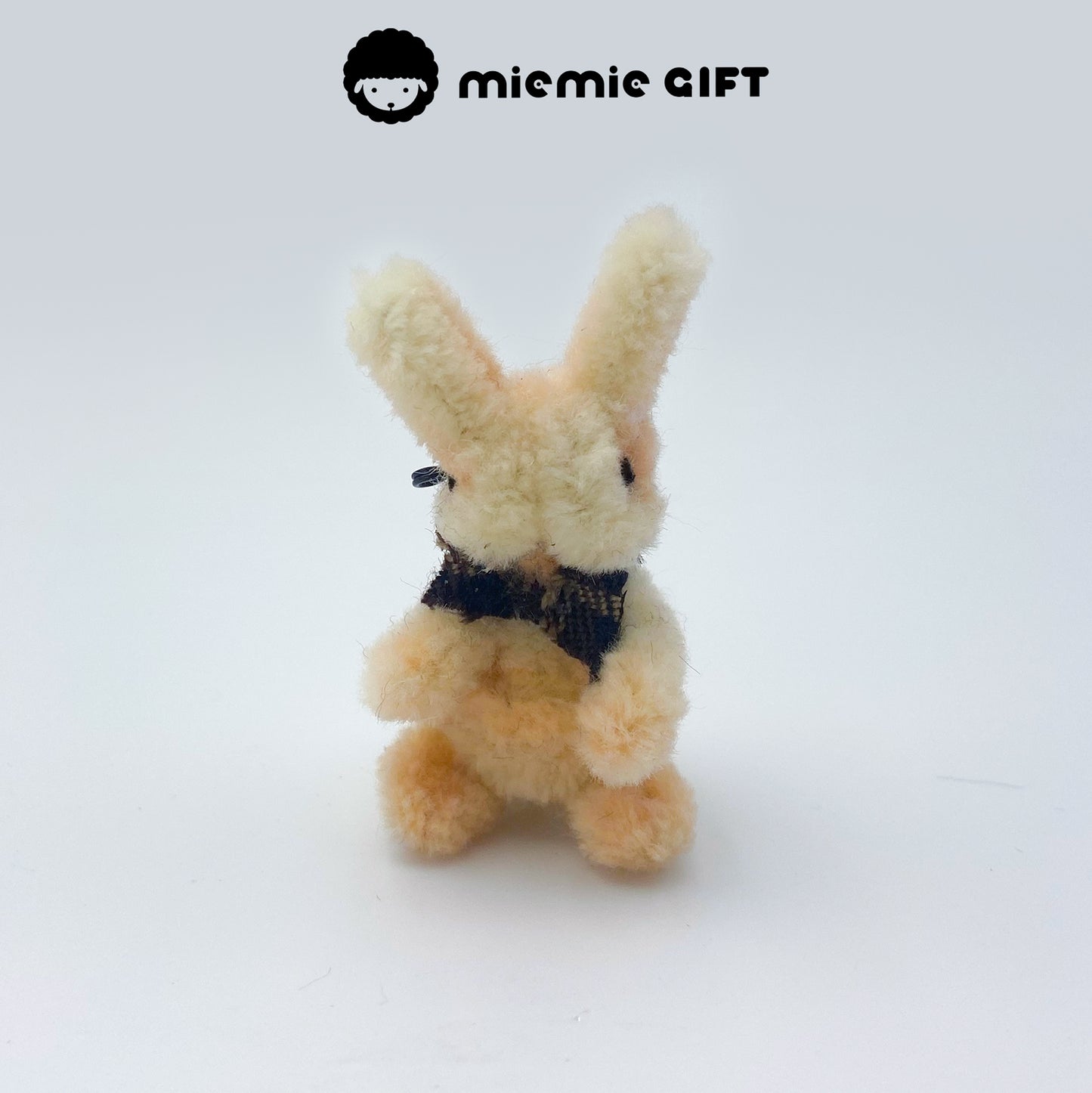 Cute Easter Bunny Brooch in Cream: Cream-colored wool pipe cleaner bunny brooch, handmade with care. This high-density brooch is a charming addition to your Easter accessories