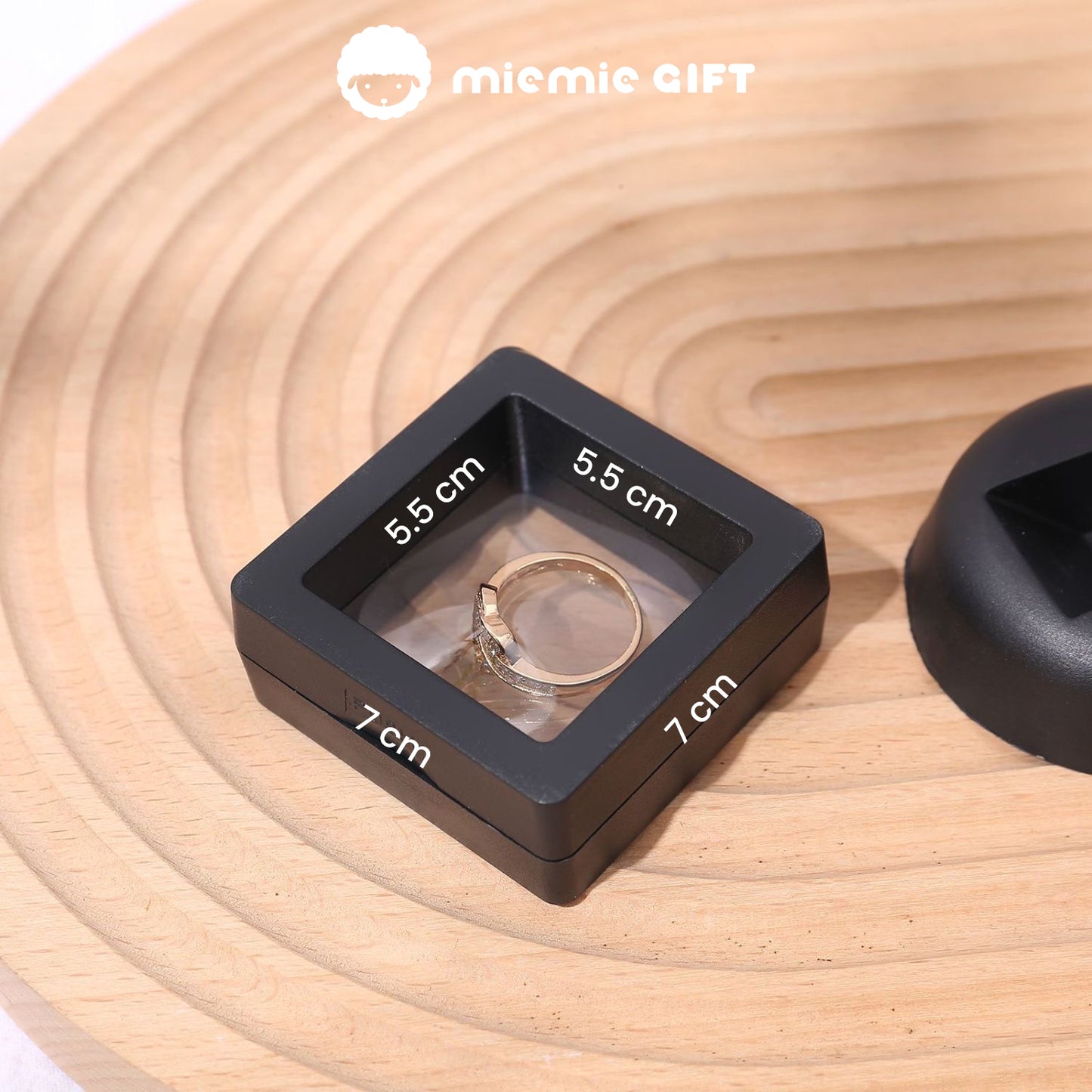 The Wooden Fish Silver Ring elegantly placed in a black 7x7 cm display box with a 5.5x5.5 cm clear window, showcasing its minimalist design and premium presentation, by MieMie Gift.