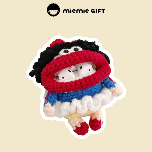 Close-up of the handcrafted Snow White earphone case with AirPods inside. The vibrant colors of the case (red, blue, yellow, and white) are showcased, complete with playful details like the black curls and red bow.