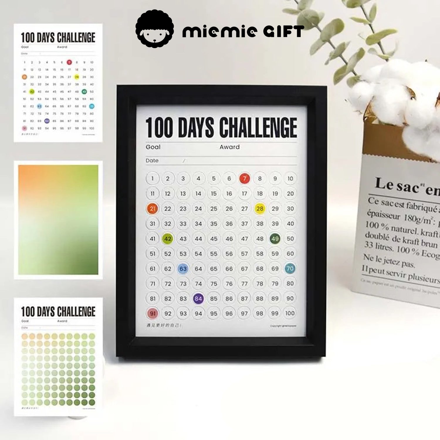 A sleek black-framed 100 Days Challenge tracker featuring vibrant gradient paper options. Perfect for goal tracking and adding a touch of elegance to your home or office decor.