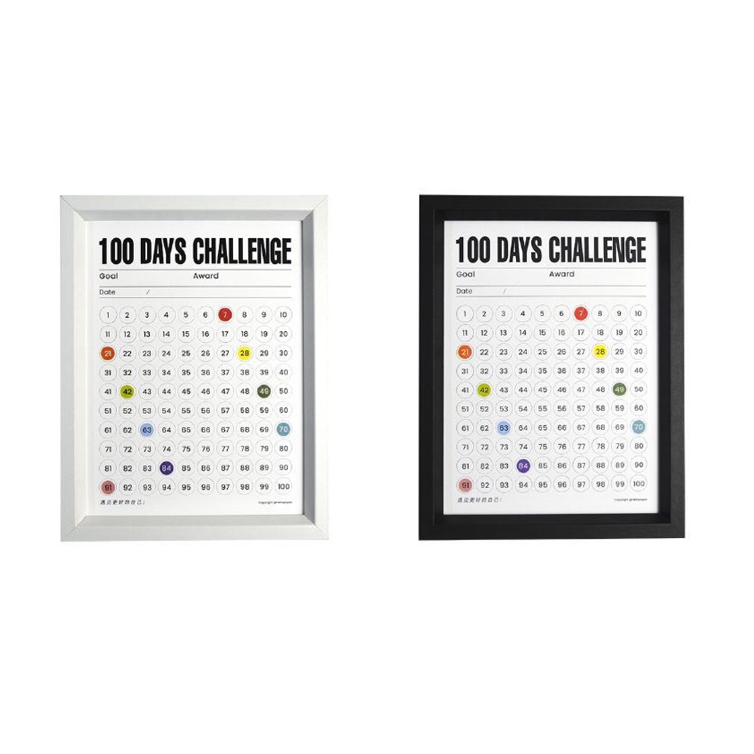 Two 100 Days Challenge Frames showcasing color-coded progress tracking, available in classic white and black frames. The minimalist design offers a stylish choice for home or office decor while keeping you motivated to achieve your goals.