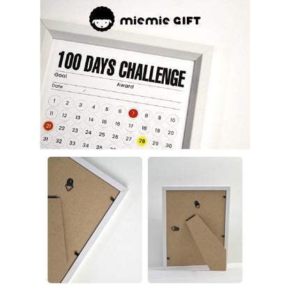 A close-up view of the 100 Days Challenge Frame displaying its minimalist design, along with detailed shots of the back panel featuring secure tabs and wall mounting hooks. The image highlights the product's durability and ease of use for both desktop and wall display.