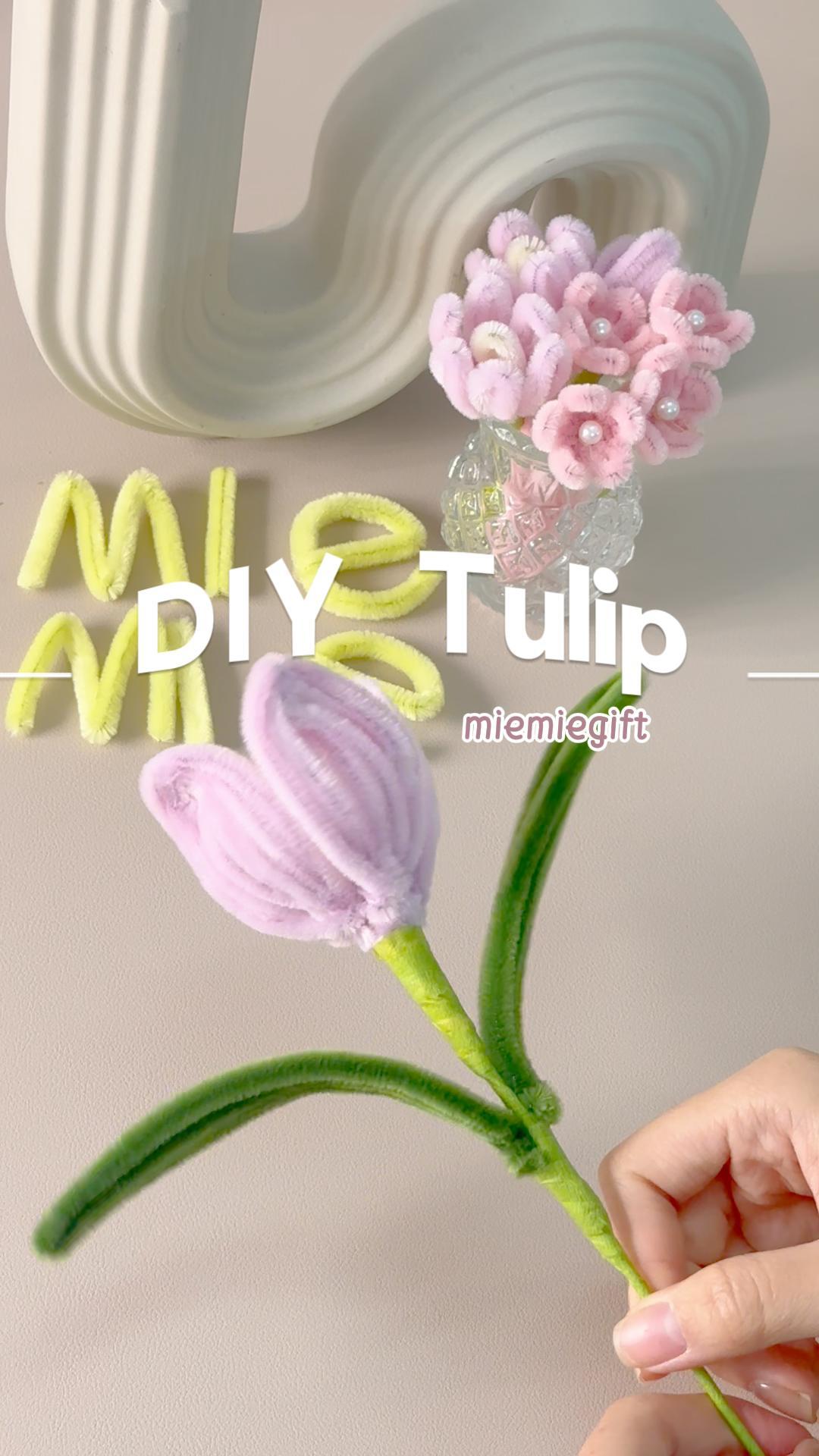 Load video: 🌷 How to Make a Tulip – DIY Pipe Cleaner Flower 🌿 Want to create a realistic tulip using simple craft materials? This step-by-step tutorial will show you how to make a beautiful pipe cleaner tulip perfect for the Pastoral Bliss Basket! 🌸✨ 🔹 Materials Needed: ✅ Petals: 8 pipe cleaners 🌿 ✅ Leaves: 4 pipe cleaners 🍃 ✅ Flower Center: 0.5 pipe cleaners 💛 ✅ Green Floral Wire ✅ Green Floral Tape 🎀 ✅ Scissors ✂️ ✅ Hot Glue Gun &amp; Glue 🔥 🎬 Chapters: 0:00 – Introduction 🌿 0:04 – Step 1: Prepare the Materials 0:05 – Step 2: Create the First Petal 0:51 – Step 3: Make the Tulip’s Center 1:12 – Step 4: Make the Leaves 1:27 – Step 5: Assemble the Tulip 💡 Pro Tips: ✅ Use floral tape for a seamless, professional finish! ✅ Adjust the petal curves to make the flower look more natural. ✅ Be careful when handling hot glue! 🔥 🔔