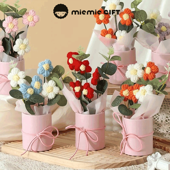 Crocheted Daisy Colorful Gift A bouquet of hand-knitted daisies in a mix of colors a charming gift for any occasion in a pink box with a bow