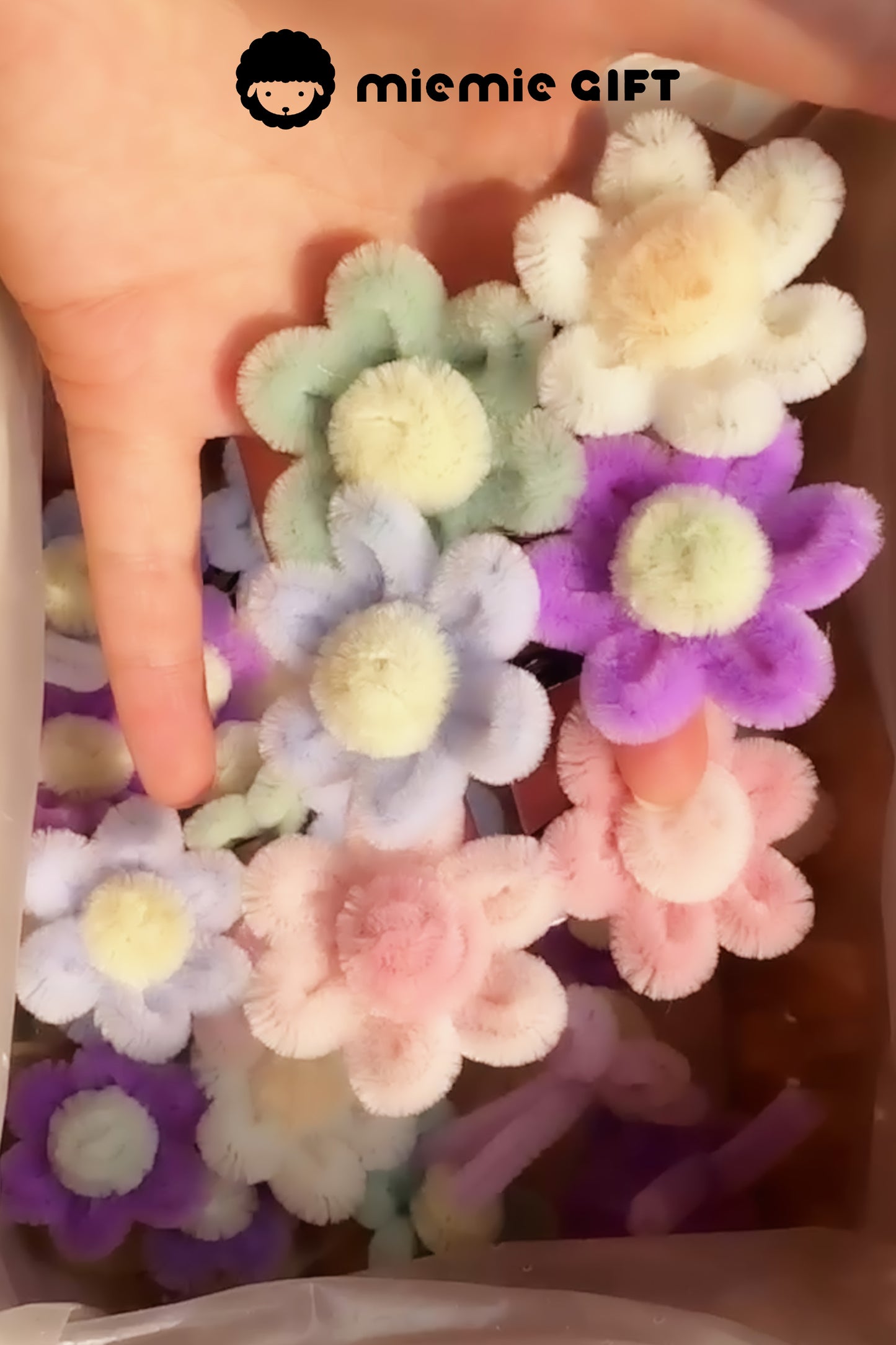 Close-up of colorful chenille flower hair clips in a wooden basket, perfect for kawaii and cottagecore styling by Miemie Gift