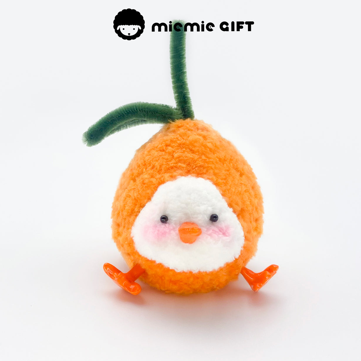 A citrusy duck doll from miemie gift, full of vibrant color and cozy charm — part of the fruit-inspired collection