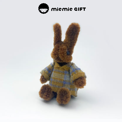 Cute Easter Bunny Fridge Magnet in Brown: Brown wool pipe cleaner bunny magnet, handmade with care. This high-density magnet is a charming addition to your Easter decor