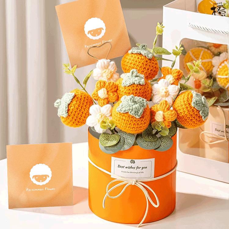 Crocheted flower Gift A bouquet of hand-knitted Persimmon Flower a thoughtful present for any occasion showcased in a orange box with a heart-shaped card