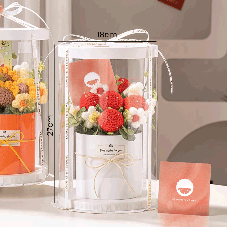Handmade Peach Blossom Gift: A bouquet of hand-knitted peach blossoms, a gift of warmth and creativity presented in a white bucket with a 'Best wishes for you' tag and clear window gift box