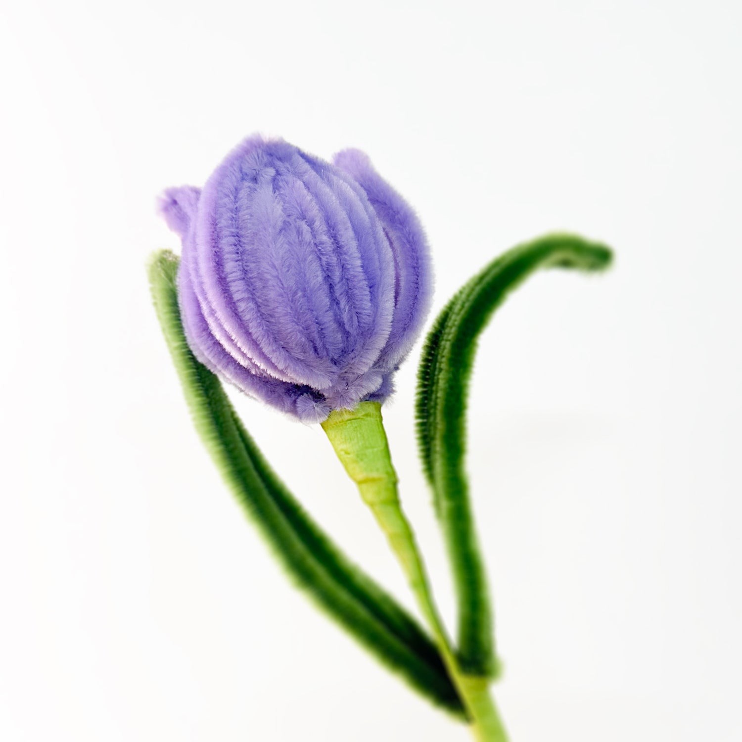 Deep purple tulip with a realistic handcrafted design, created using soft pipe cleaners.