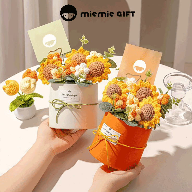 two bouquets of hand-knitted sunflowers a thoughtful and unique gift displayed in a white bucket and an orange bucket