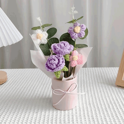 Crochet Rose Flower Pot A pastel pink pot filled with hand-knitted purple rose a perfect gift for any occasion