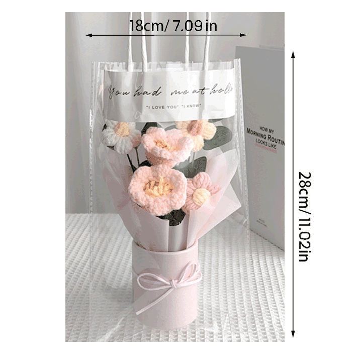 Charming lily of the valley arrangement with mixed crochet blooms, wrapped in delicate pastel paper in gift bag size