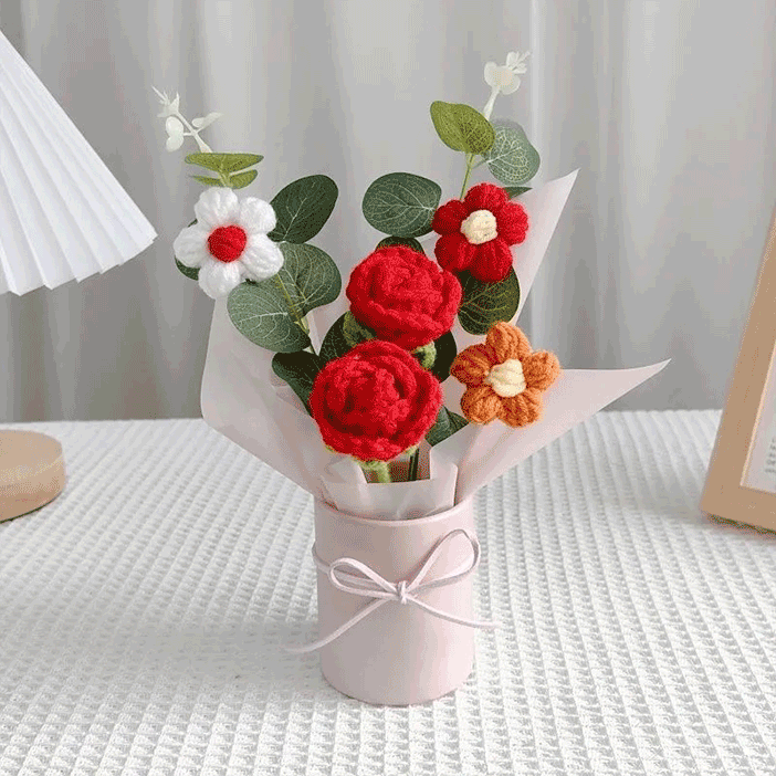 Crochet rose Bouquet: A bouquet of hand-knitted red rose a symbol of Passionate love in a pink pot