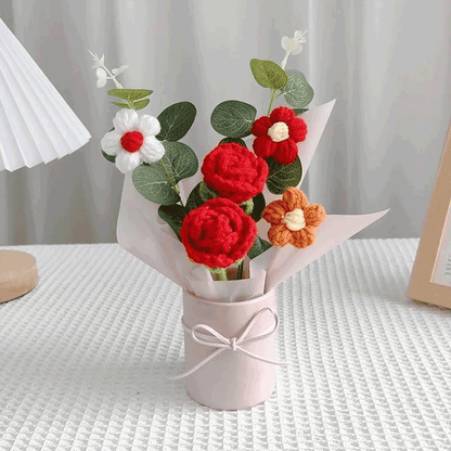 Crochet rose Bouquet: A bouquet of hand-knitted red rose a symbol of Passionate love in a pink pot