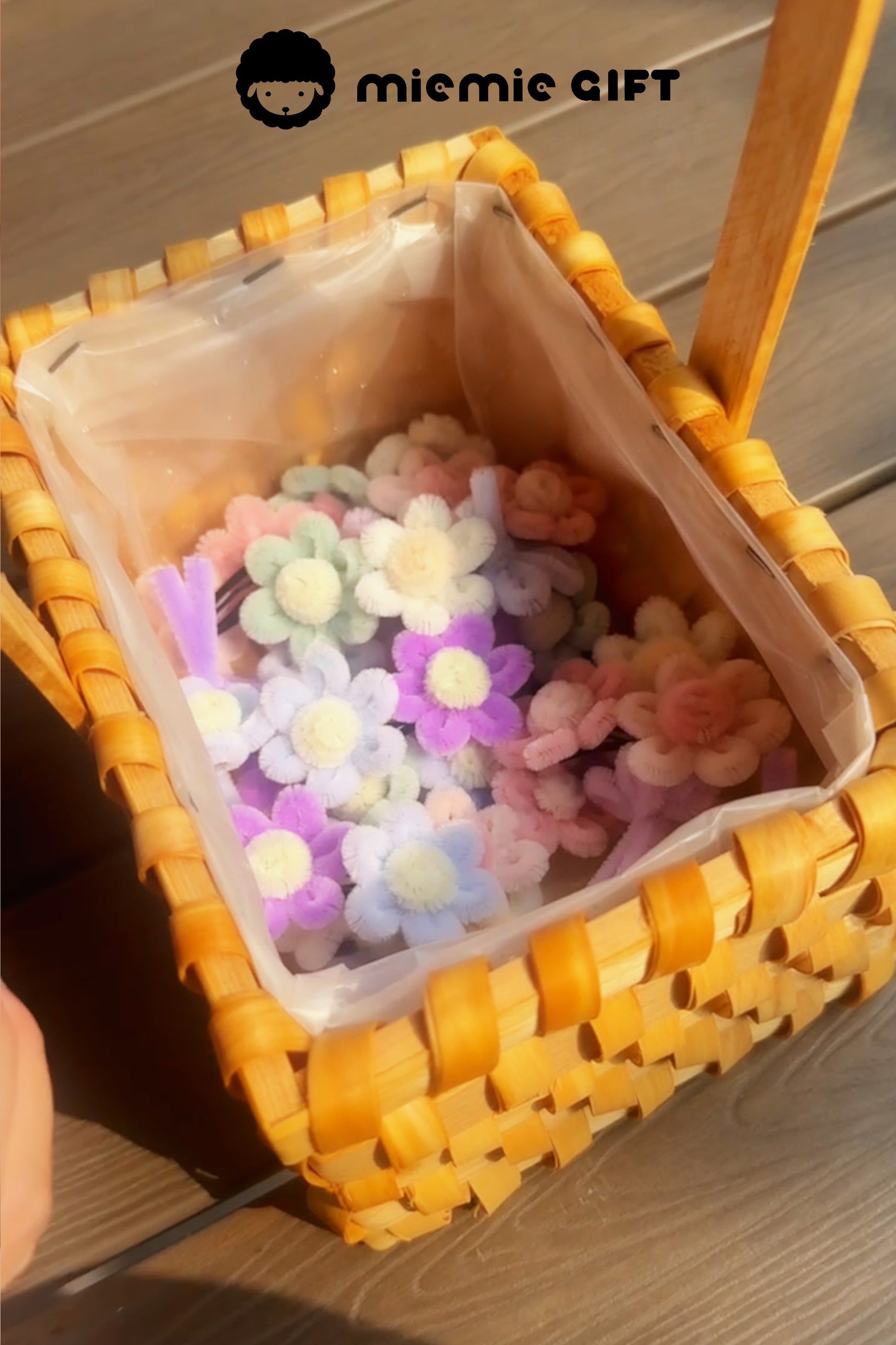Soft and fluffy pastel chenille flower clips for hair – handmade Miemie Gift accessories in a natural wood basket setting


