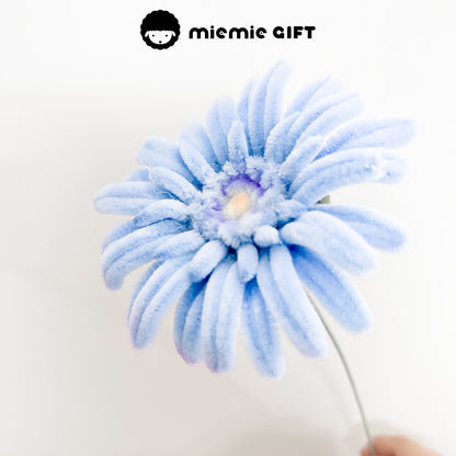Handmade light blue frangipani flower crafted with pipe cleaners by MieMie Gift, perfect for DIY crafts and home decor.