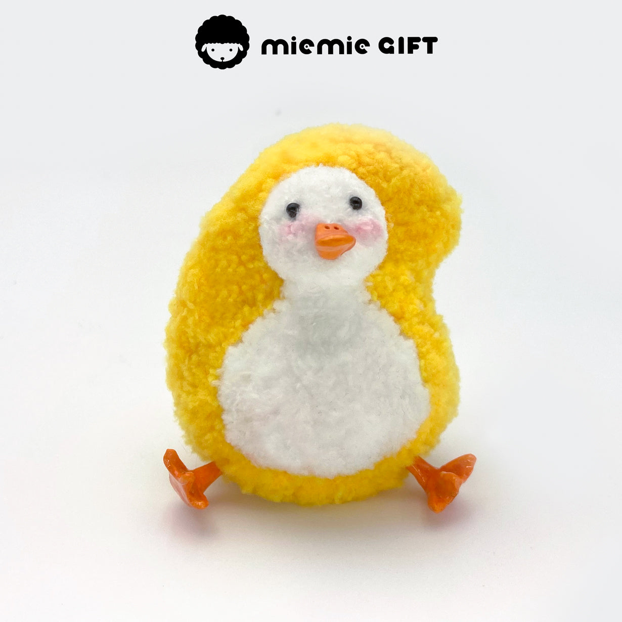 A soft and tropical mango duck from miemie gift, designed with smooth color blending and fuzzy textures.