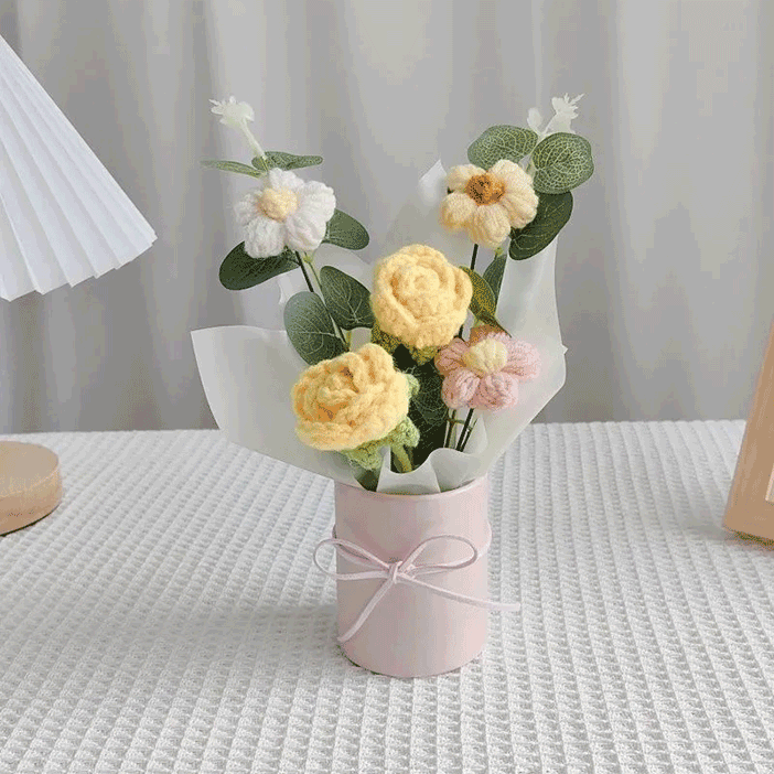Knitted yellow rose Gift Set A bouquet of rose crafted with care tied with a pink ribbon, and accompanied by a white wrapping paper