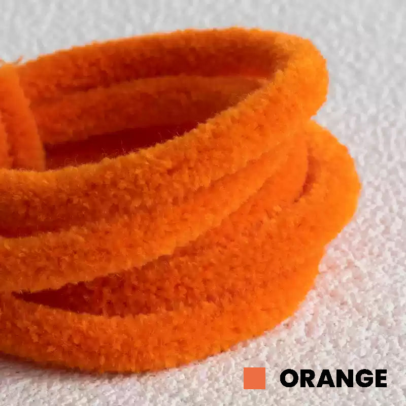 Orange Pipe Cleaner by miemie gift: High-density orange pipe cleaner, ideal for creating vibrant and lively dolls. Perfect for making a bright carrot or a lively pumpkin character, emphasizing the hand-made quality and vivid color.
