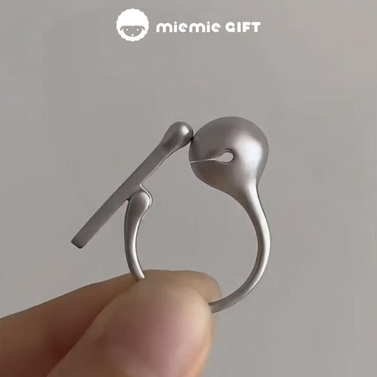 Close-up of the Wooden Fish Silver Ring, a minimalist 925 sterling silver ring featuring a functional wooden fish mallet design, perfect for stress relief and mindfulness, presented by MieMie Gift.