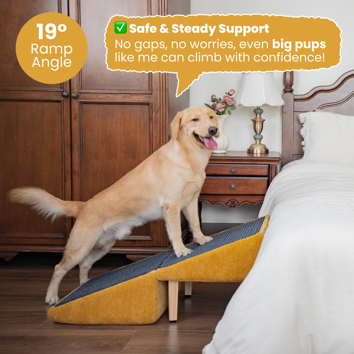 A happy golden retriever confidently standing on a mustard-yellow dog ramp leading to a white bed. The ramp features a 19-degree incline, anti-slip carpet surface, and sturdy wooden legs, designed for large dogs. The background includes a classic wooden nightstand, brass lamp, and floral accents, creating a cozy bedroom scene. A speech bubble highlights the ramp’s safety and stability for big pups.