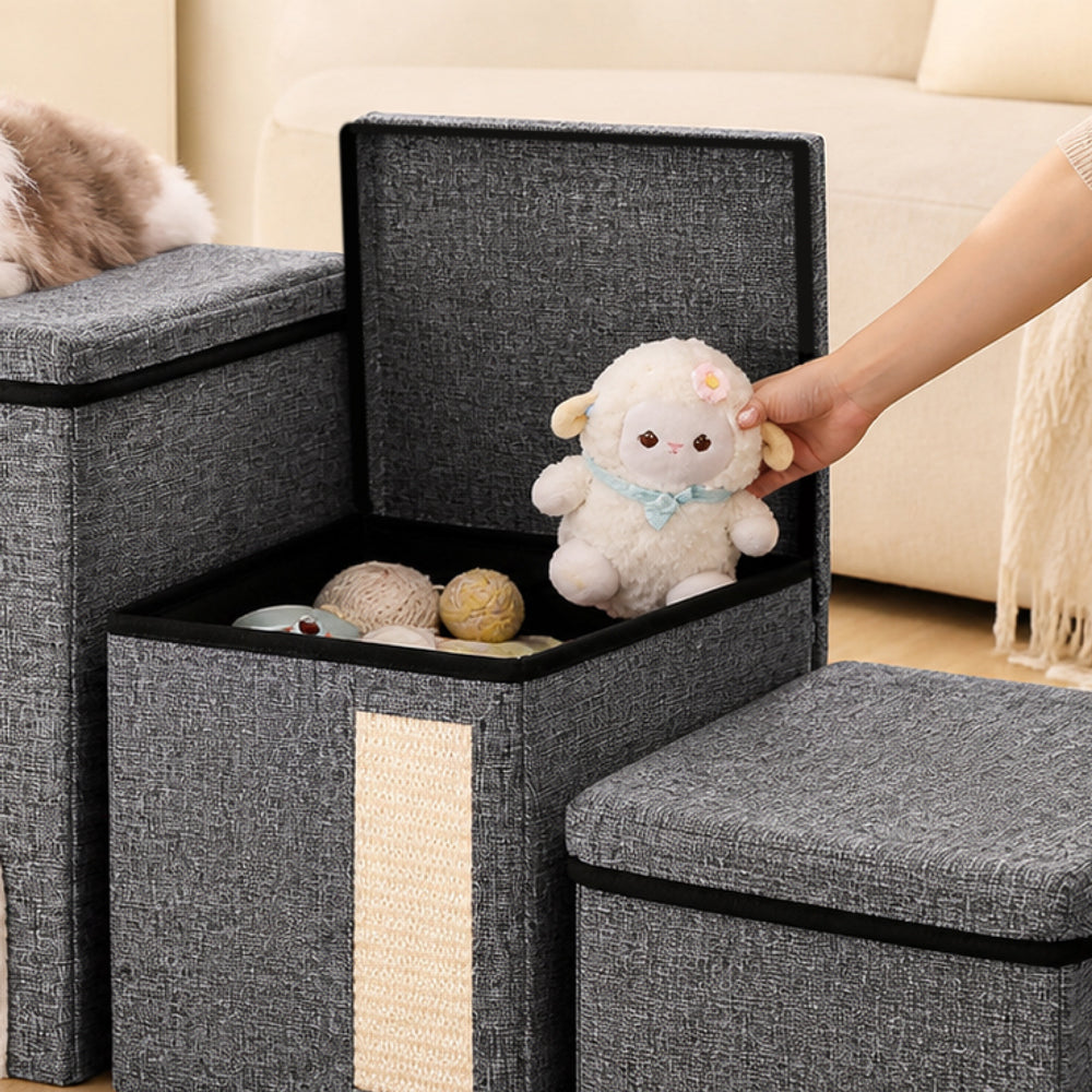 Open storage compartment in foldable pet stairs holding pet toys and accessories.