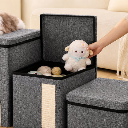 Open storage compartment in foldable pet stairs holding pet toys and accessories.